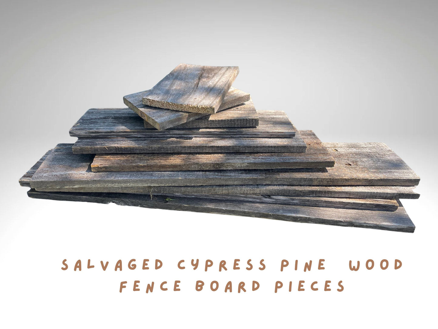 Weathered, salvaged cypress pine wooden fence board pieces